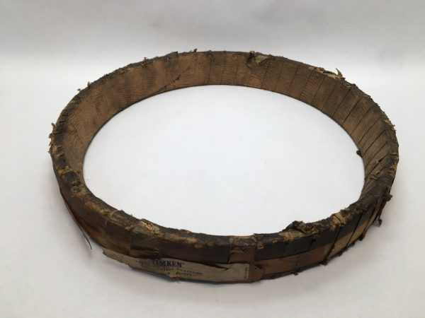 Timken 76520 tapered roller bearing cup wrapped in protective paper wrapping