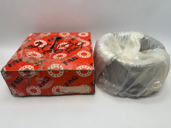 FAG H3036 bearing adapter sleeve wrapped in plastic beside its original FAG box