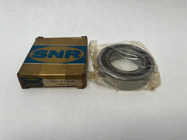 SNR 7007 CUJ74 angular contact ball bearing, shrink-wrapped, beside its original SNR box