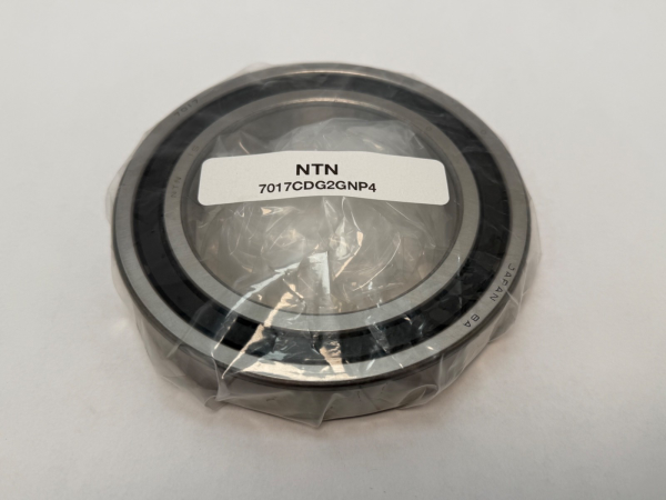 NTN 7017CDG2/GNP4 angular contact ball bearing, shrink-wrapped, showing manufacturer label