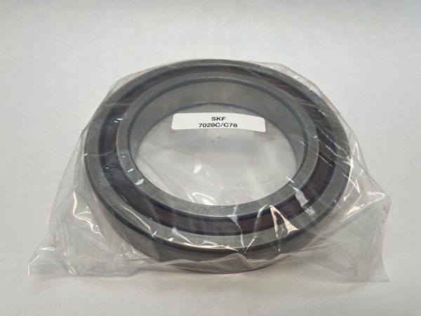 SKF 7028CTCC78 angular contact ball bearing, 140 mm bore, sealed in plastic with label