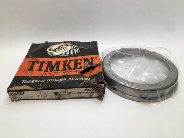 Timken 98788B-3 flanged tapered roller bearing single cup, shrink-wrapped, beside its original Timken box